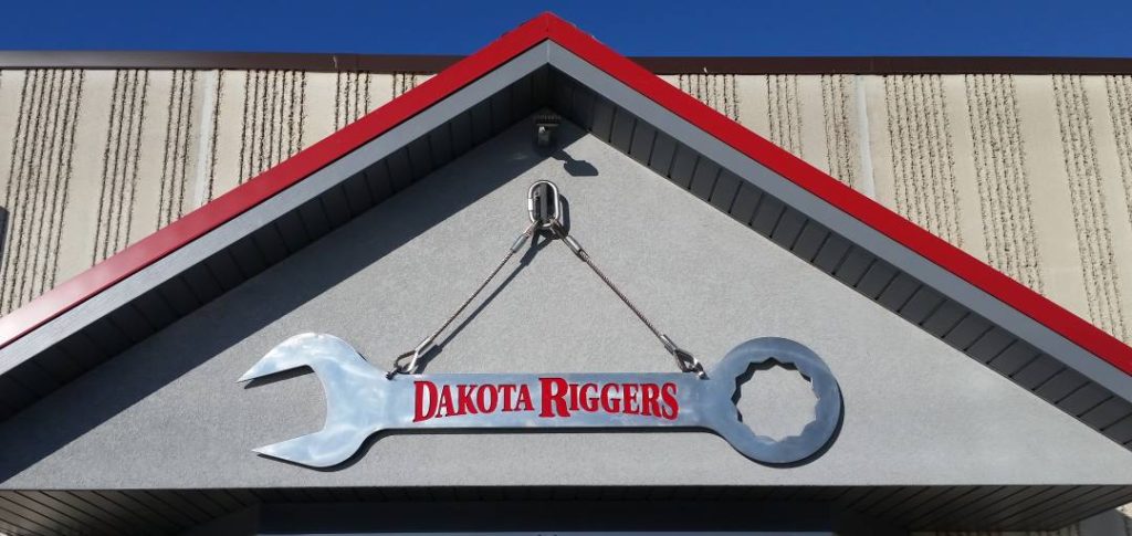 Dakota riggers, large wrench, outdoor signs, tools