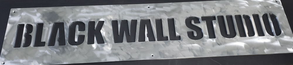 Aluminum sign for Black Wall Media